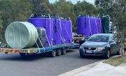 Smart-Bund-Fuel-and-Chemical-Storage-Tanks-Loaded-on-Truck-for-Freight-and-Delivery